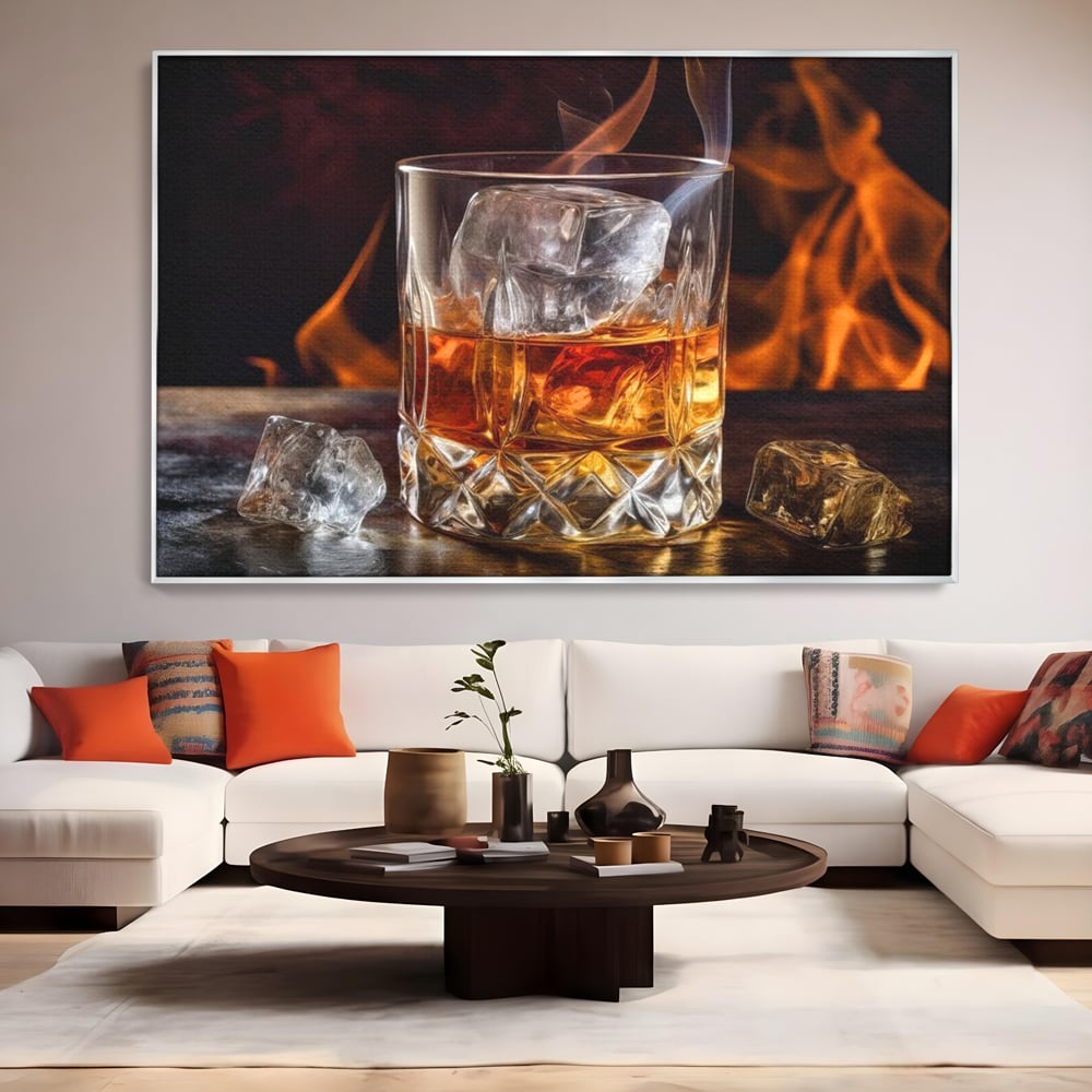 Tablou canvas cu tablou canvas cu pahar de whisky si foc, in rama de aluminiu argintiu, pe perete intr-un living